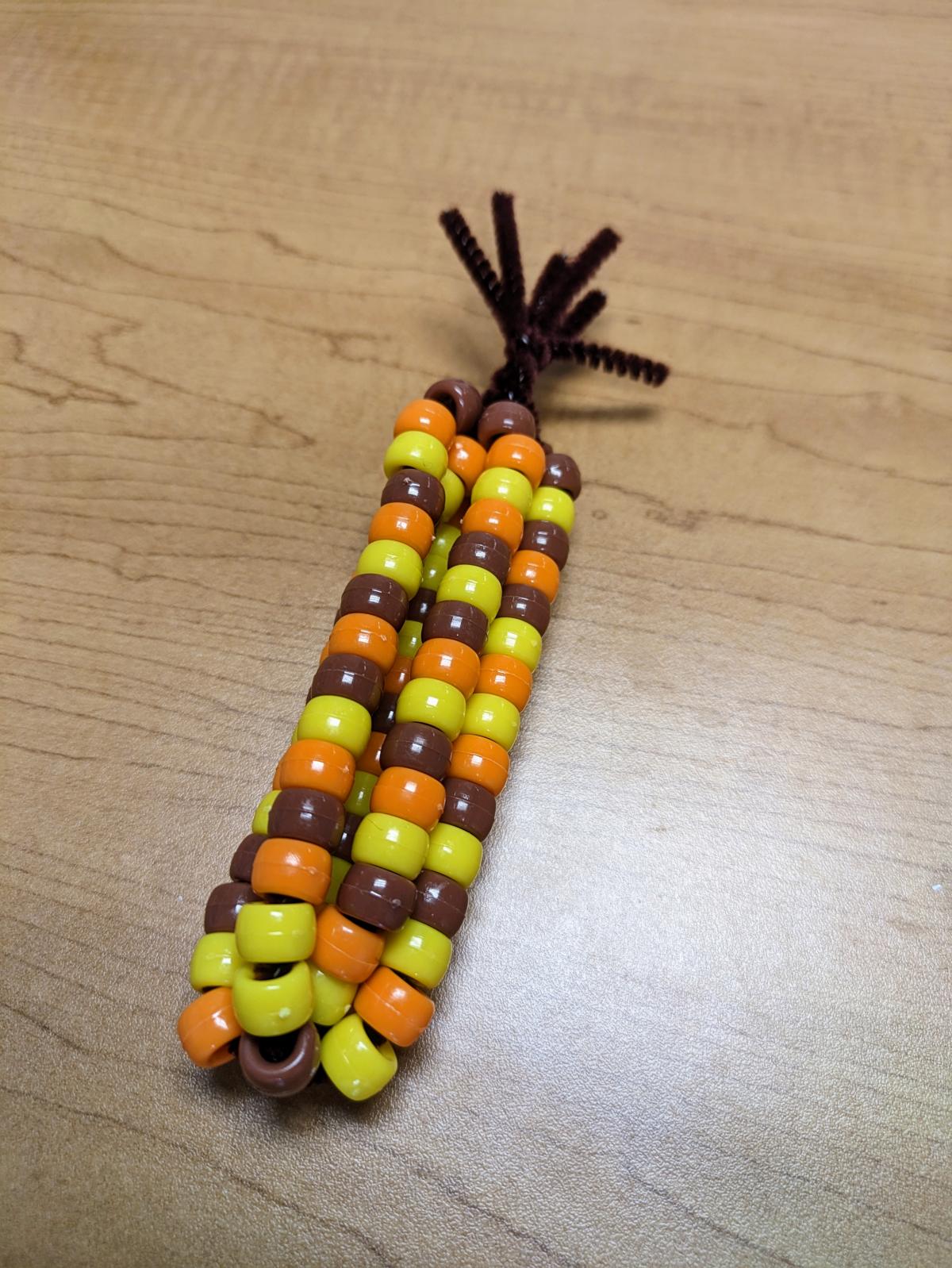 image of corn made of beads and pipe cleaners